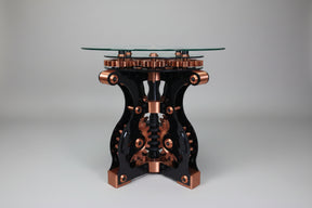Mechanical wall bracket with gears on a green and wooden background